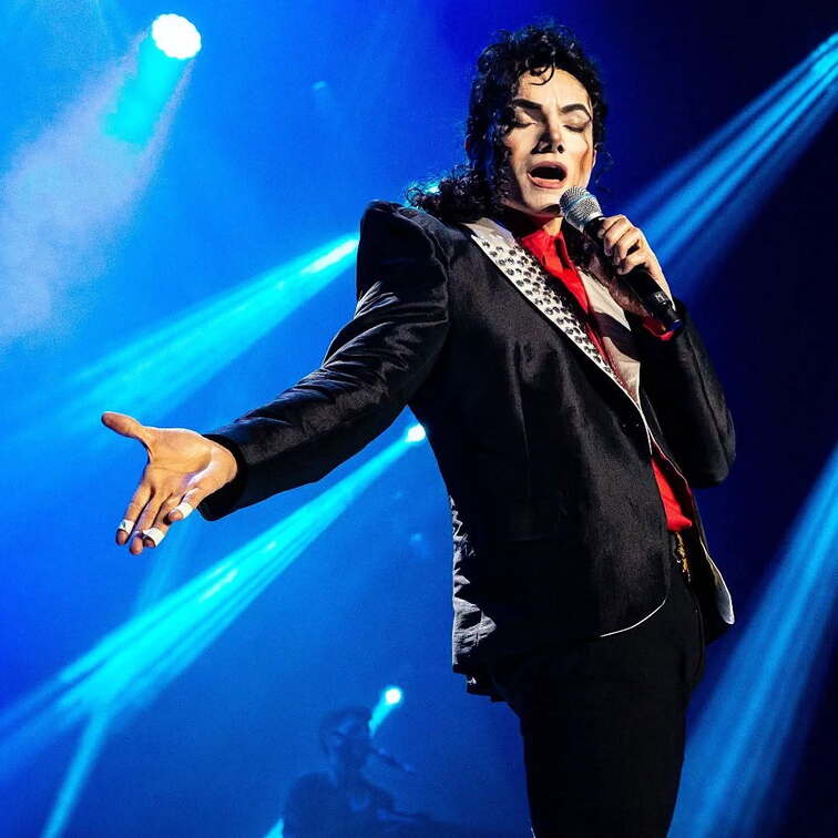 Michael Comes to The Podium
